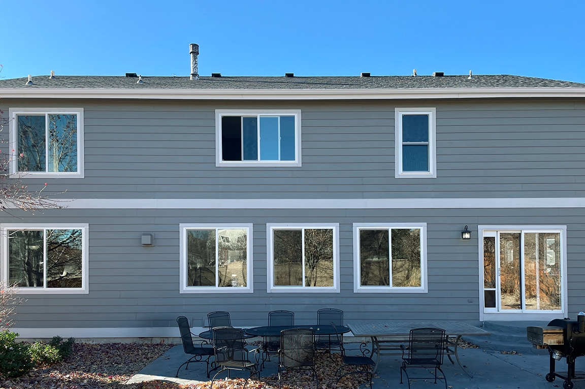 After image of white windows after Colorado Springs hailstorm.