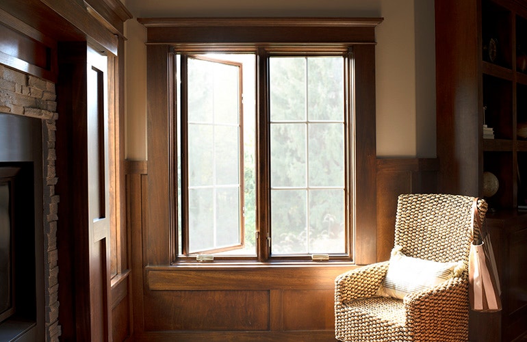 two lifestyle series casement windows dark wood in a study