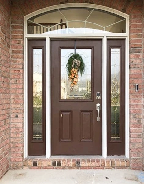 Single fiberglass door on the front of Medina home in need of replacement.