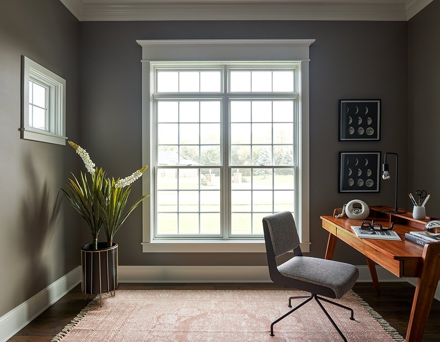 minimalist contemporary home office dark gray walls two white windows