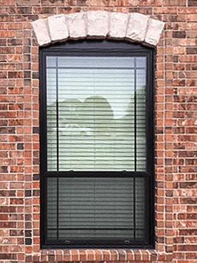 Newly installed Pella black windows on Oklahoma City home.