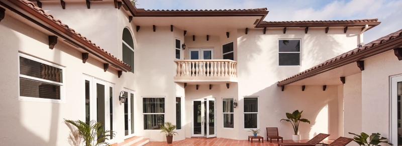 exterior home in tropical region with hurricane shield windows