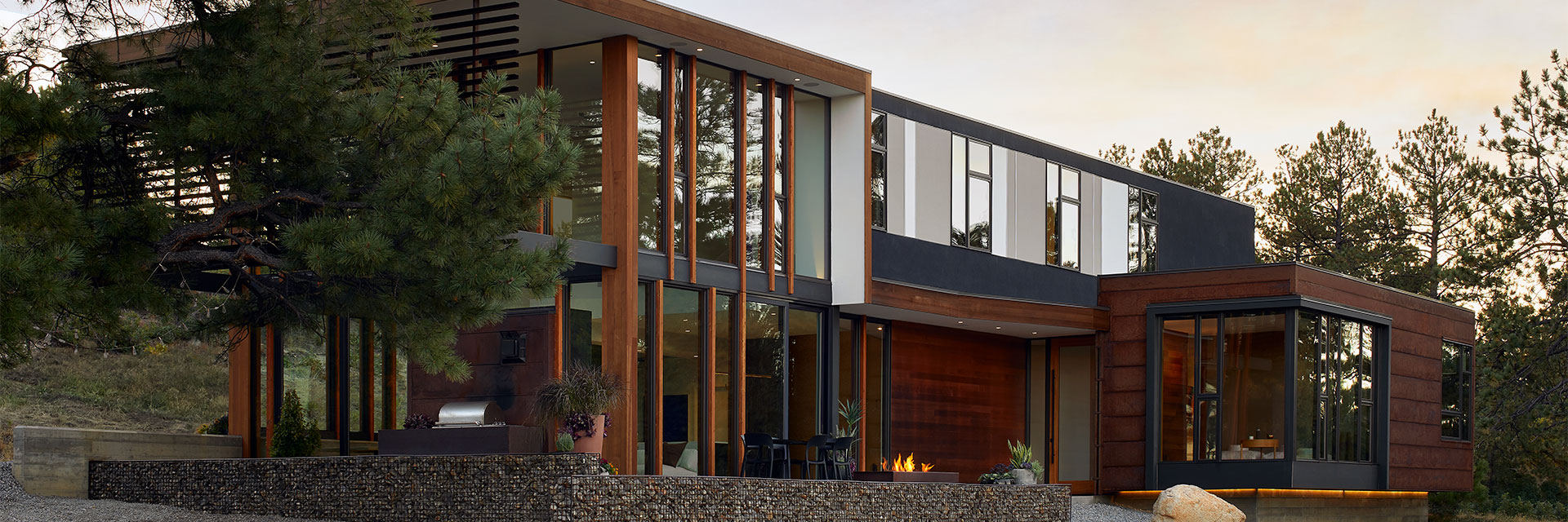 an ultra contemporary Pacific Northwest home exterior with floor-to-ceiling windows