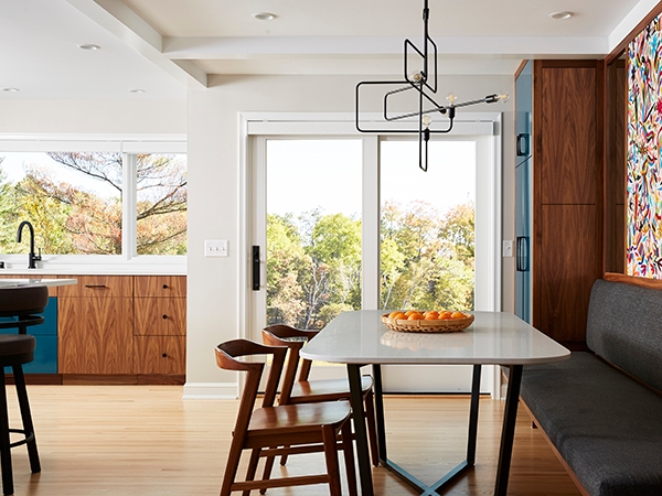 Mid-century modern kitchen in Minnesota home with newly installed Pella sliding patio doors.