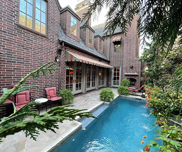 hinged patio doors open up home to backyard space