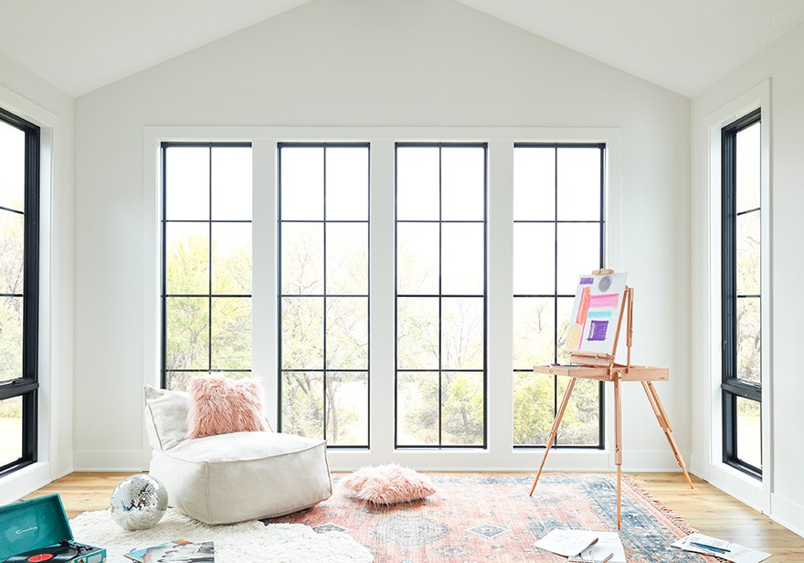 six black wood windows sunroom energy-efficient
