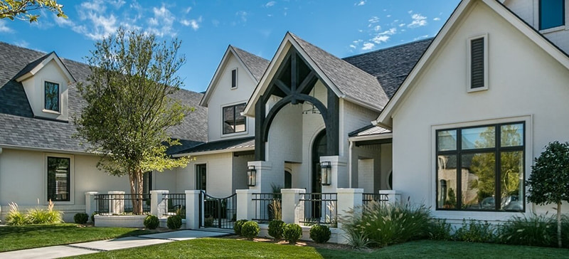 Amarillo modern farmhouse with newly installed black Pella wood casement windows.