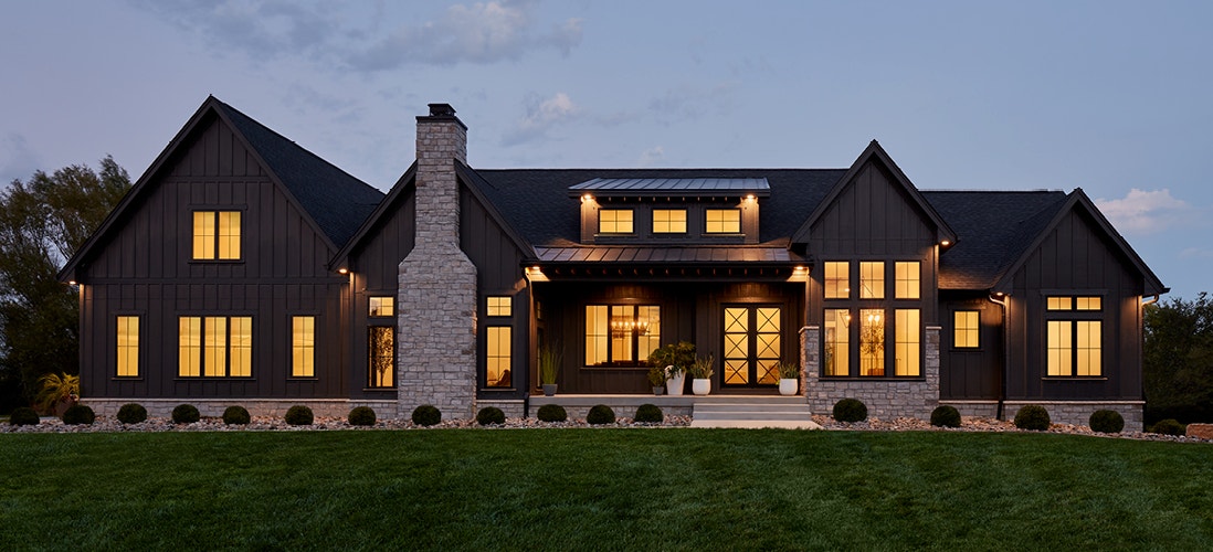 exterior home in the evening with pella fiberglass windows