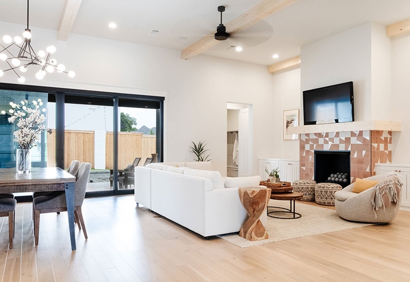 New home interior living room light coloring and black sliding patio doors