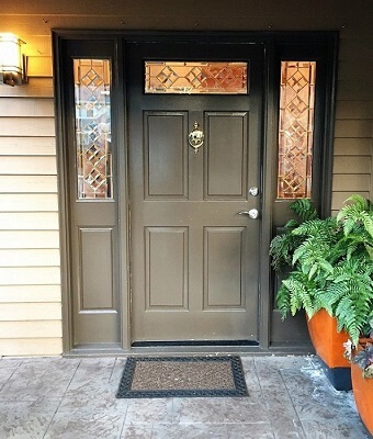 Before - Weathered Front Door On Craftsman Style Home Brown and weathered front door with sidelights and a transom