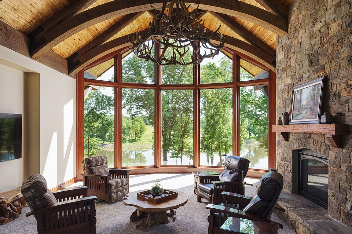 Kansas City Modern Cabin living space highlighting curved window wall.