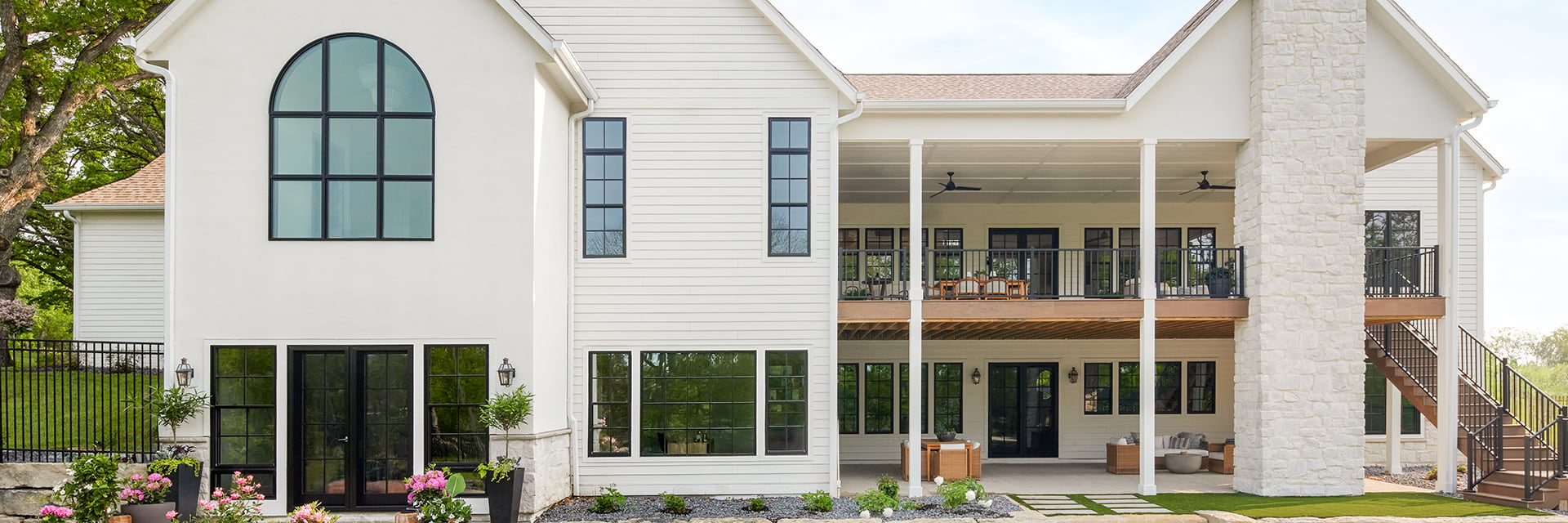 White home in Harrisburg with a dual deck.