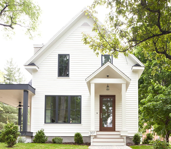 white pella house with reserve casement windows