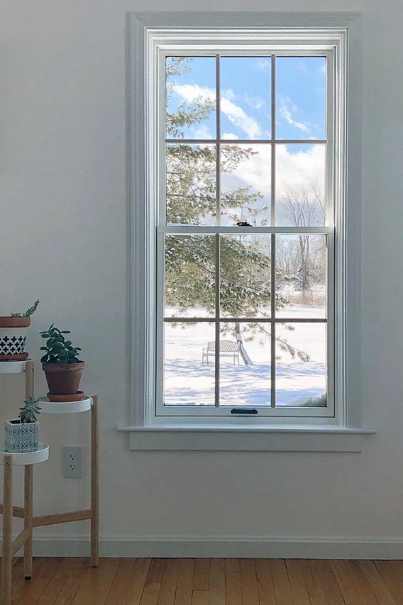 Interior view of double-hung windows in Vermont historical home.