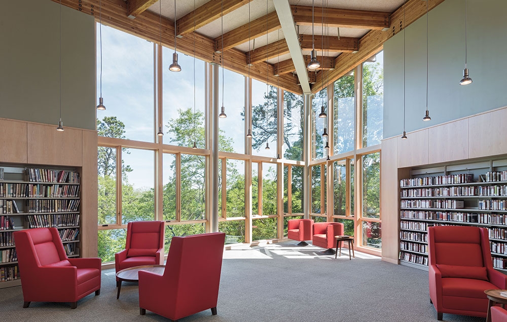 Interior view of the Eastham library with newly installed wood windows blending modern design and historical charm.