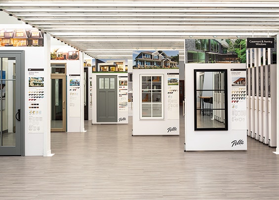 two women looking at a product inside a pella experience center