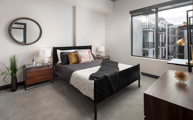 master bedroom king bed with sliding fiberglass windows