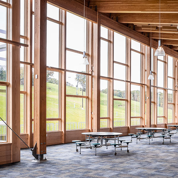 Construction of floor to ceiling windows for a ski chalet in Bloomington.