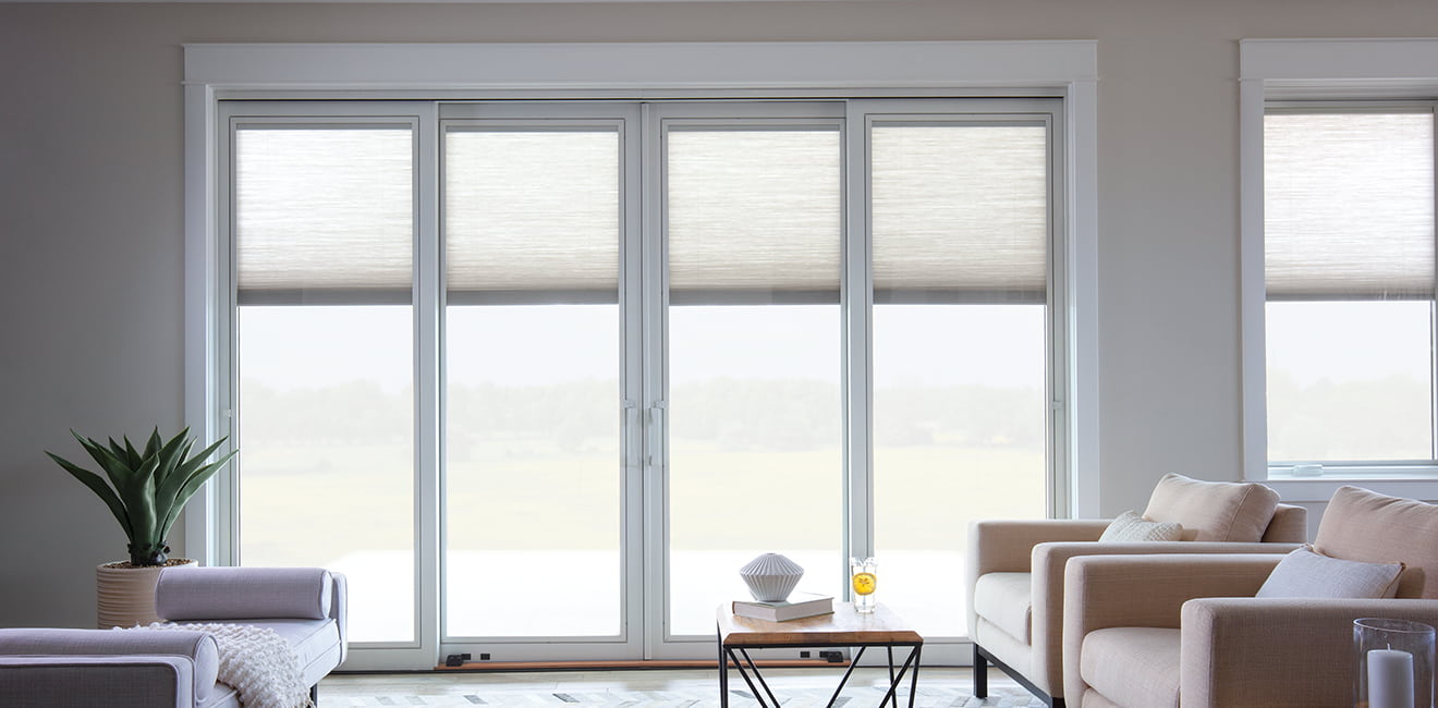 an expansive two-panel sliding patio door with blinds-between-the-glass