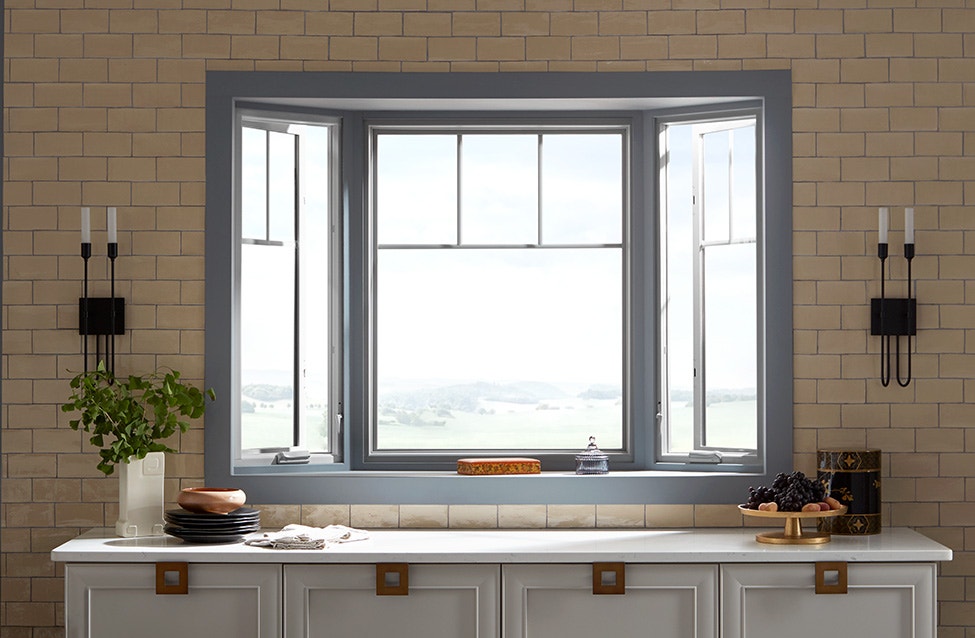the kitchen, interior view of a charcoal gray bay window