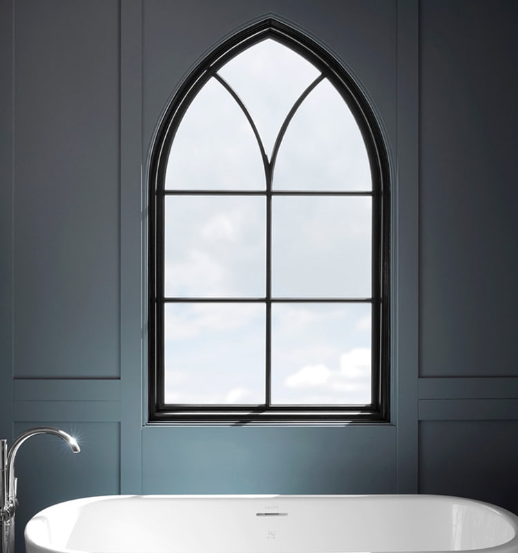 custom arched window over a soaker tub with custom grilles
