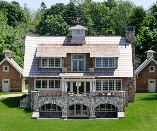 Exterior view of Bristol Highlands bungalow  home with newly installed windows and front door.