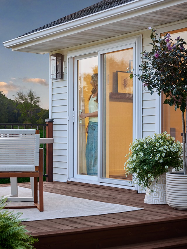 Sliding patio door opening to outdoor deck.