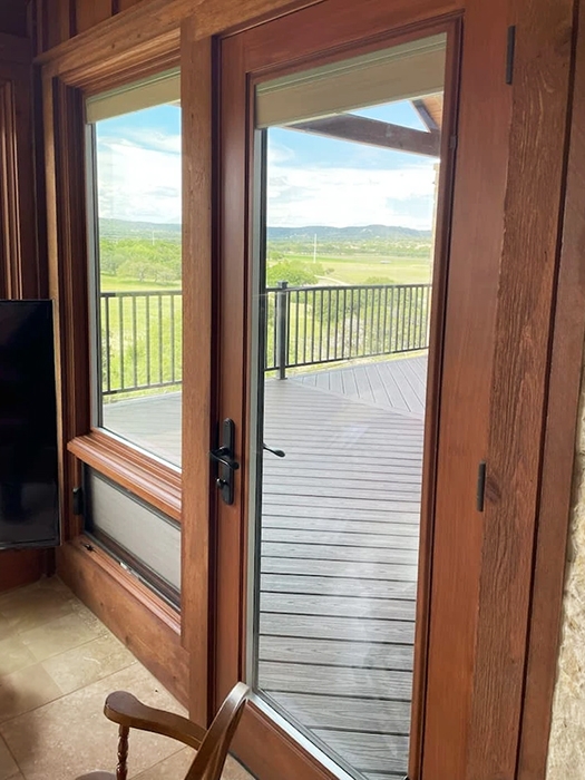 Bandera sunroom entryway with newly installed Pella patio door.