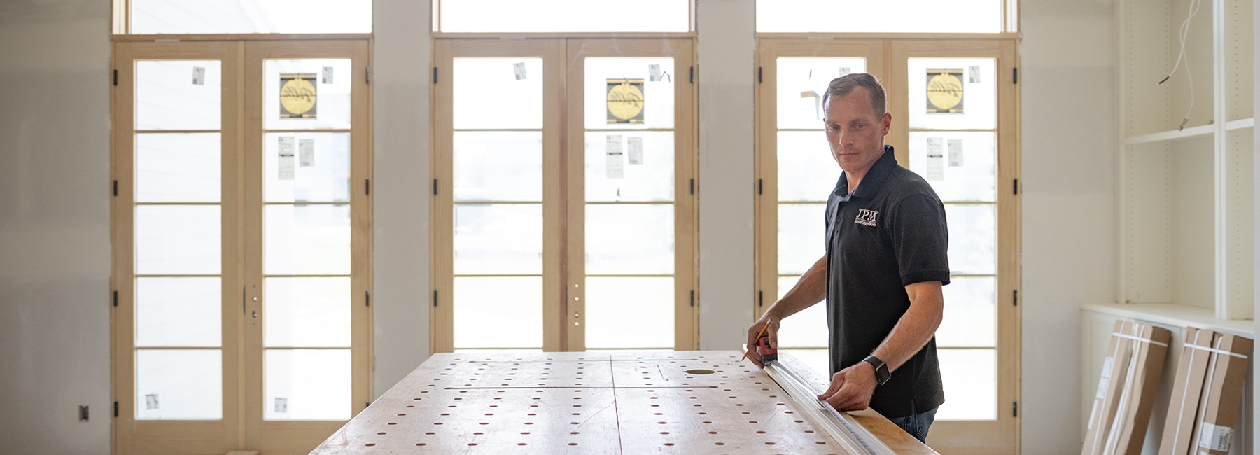 jason mollack working on a construction table
