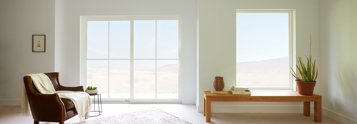 beige living room with a 250 series sliding door