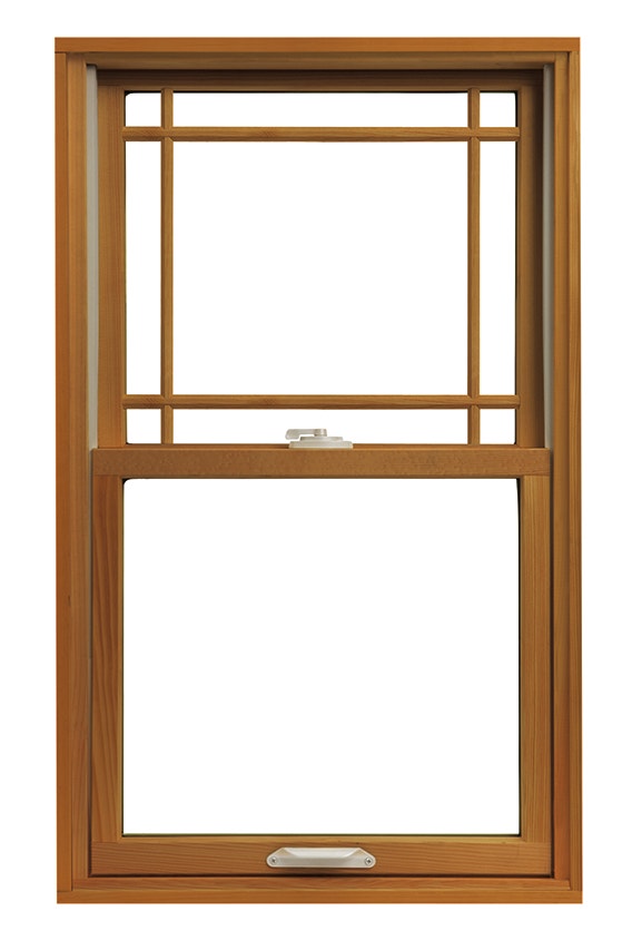 Wood window with prairie grid window seen on w white background.