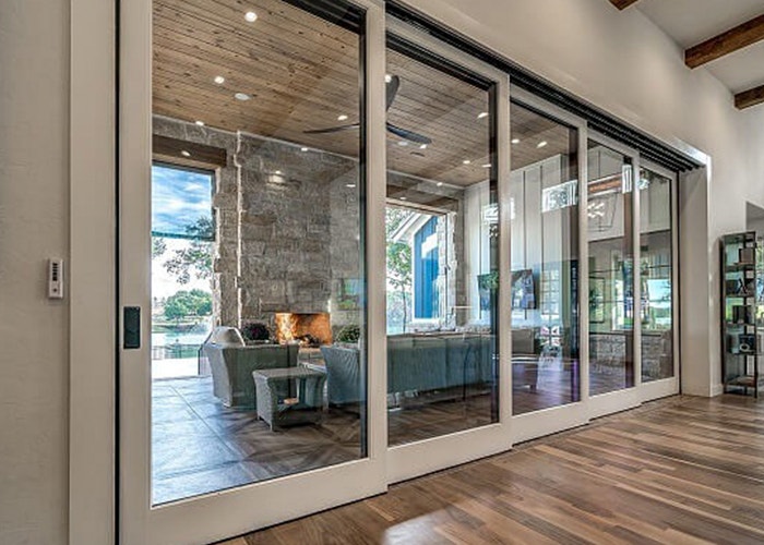 the interior view of a five-panel multi-slide patio door that is closed