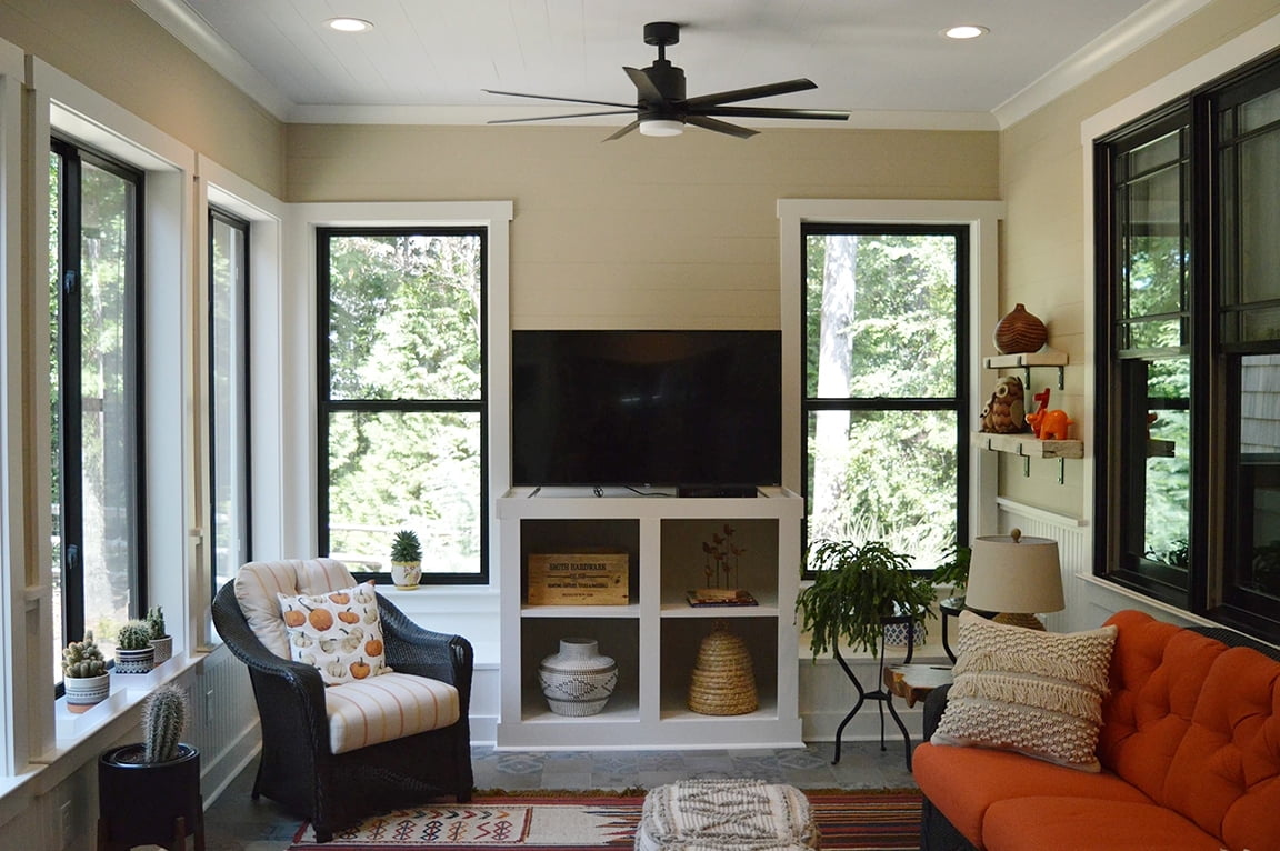 Interior view of Richmond sunroom with newly installed Pella black windows.