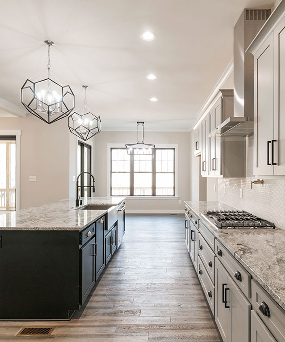 Interior view of a kitchen in Midlothian home with farmhouse windows.