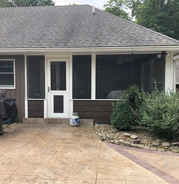 Outdated screened-in porch on Richfield home. 