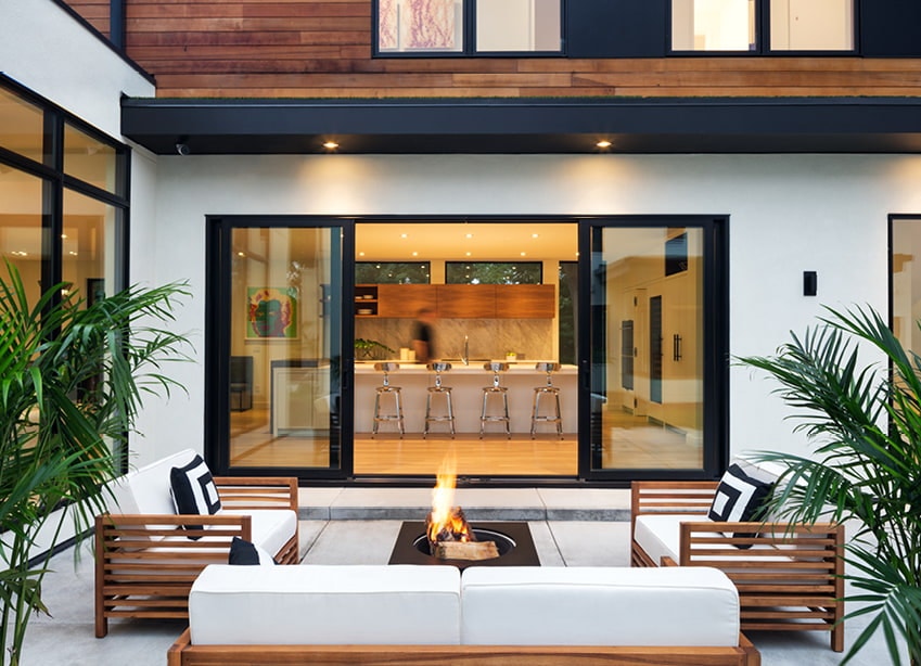black patio doors on a contemporary deck