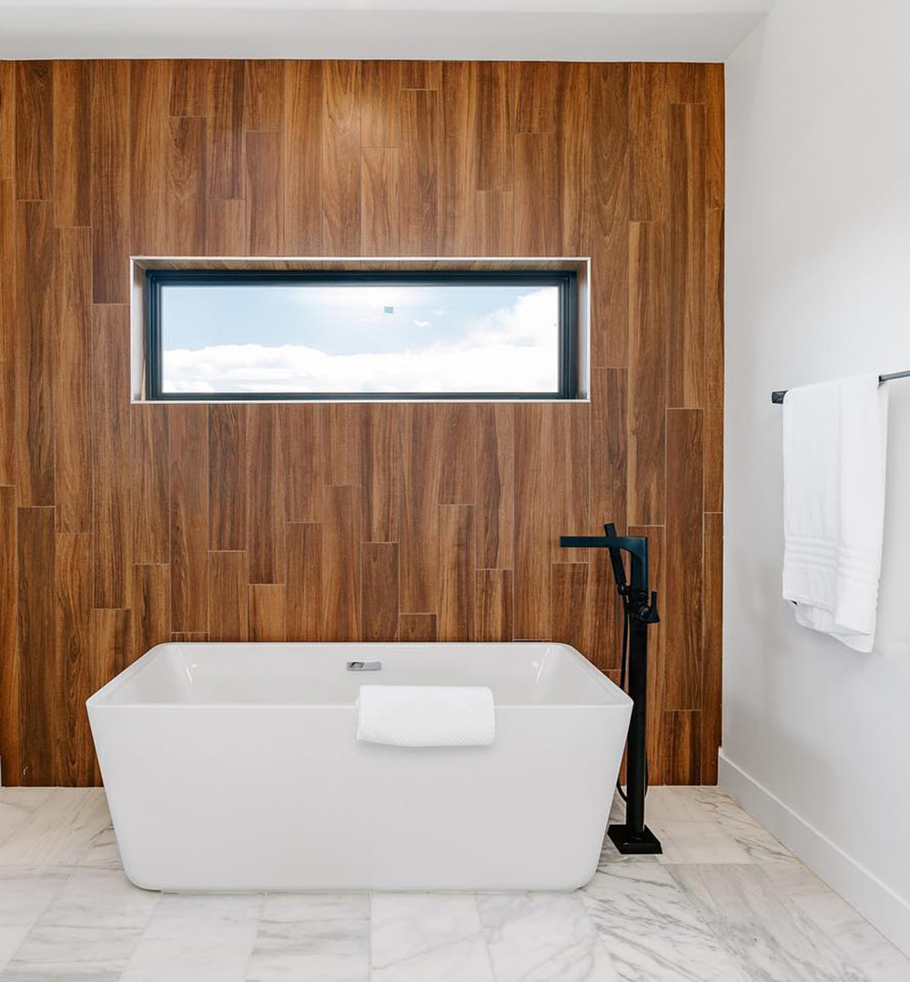 Picture Window on Wood Accent Wall Suggests Feel of an At-Home Spa | Pella