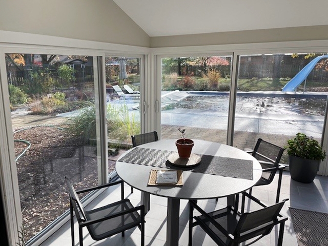 After sunroom sliding patio doors for dining area.
