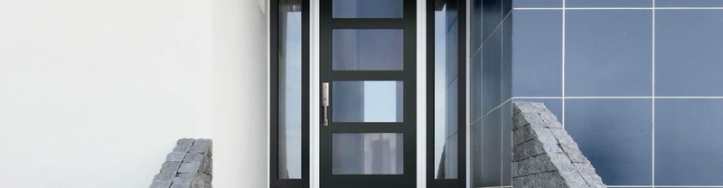 black contemporary entry door with full glass sidelights