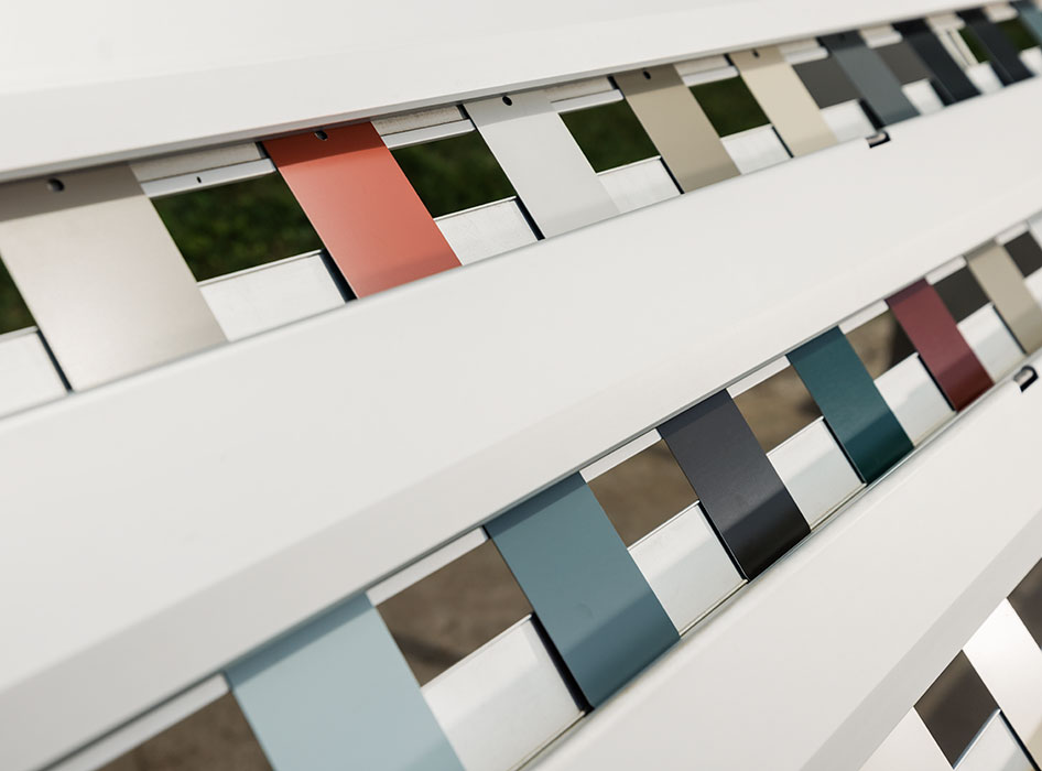 several samples of roll form and cladding samples in various colors