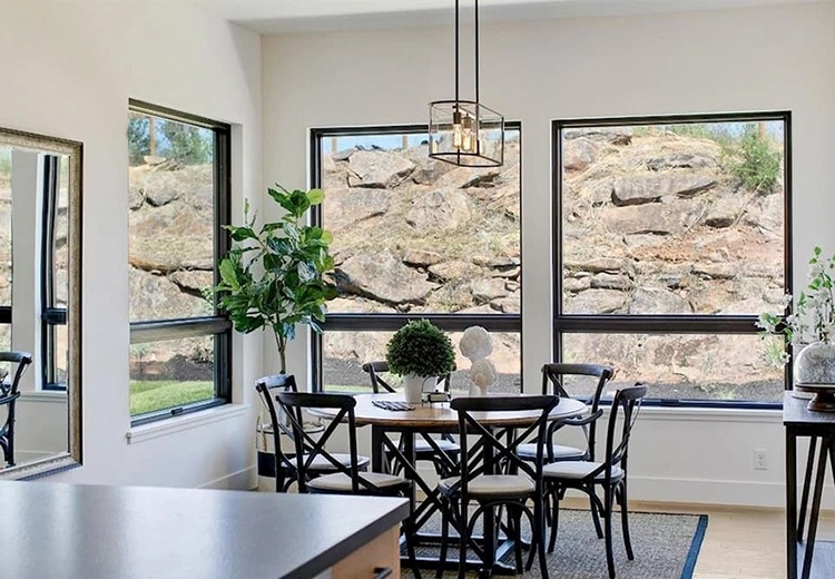 Dining room in Santa Rosa home with newly installed Pella contemporary wood windows.