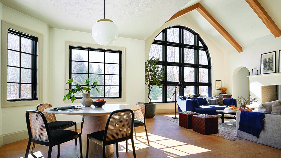 Idaho cottage home living room with black arch window.