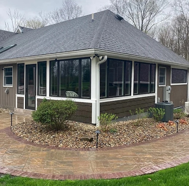 Newly installed sunroom for Richfield home using casement windows and hinged french patio door. 