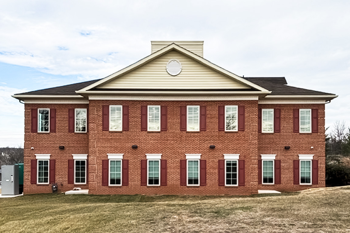 Front of a Pottstown, PA commercial building featuring newly installed Pella windows.