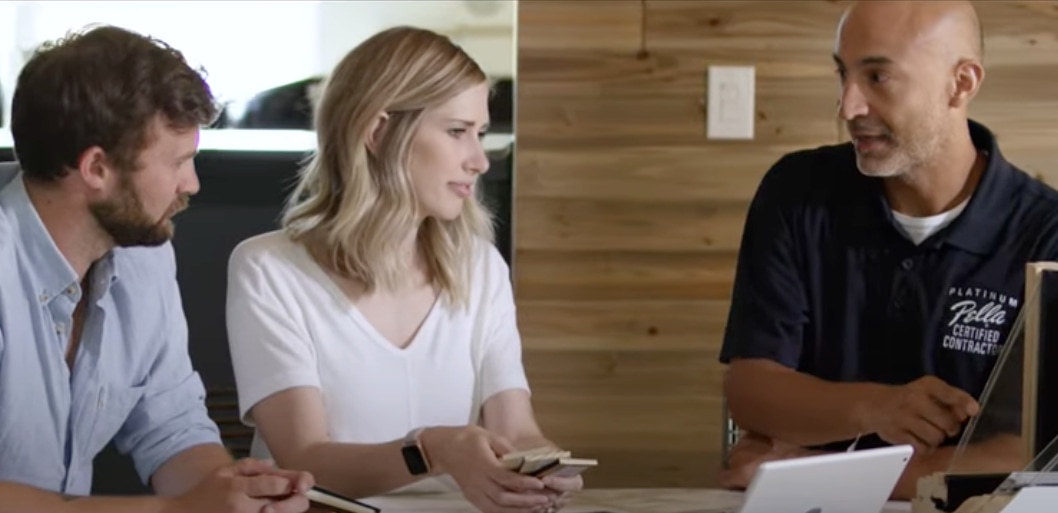 two people working with a Pella Certified Contractor