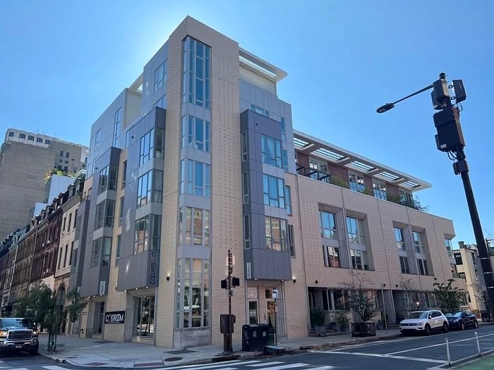 Street view of Walnut Estates in Philadelphia with newly installed noise-reducing wood windows.