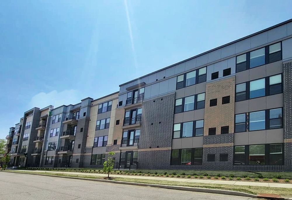 Sideview of the Addis View apartment complex in Cleveland with black fiberglass windows.