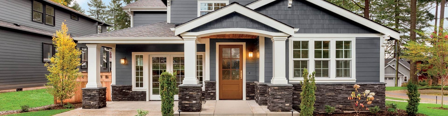 exterior of home with glass entry door