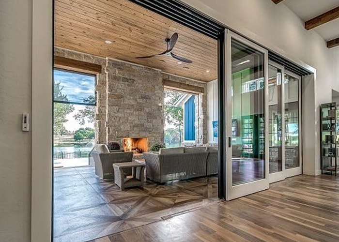 the interior view of a five-panel multi-slide patio door that is open