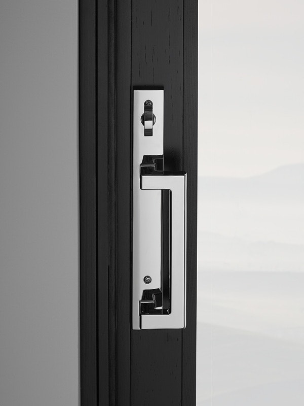 Chrome Door Handle on Black Sliding Door
